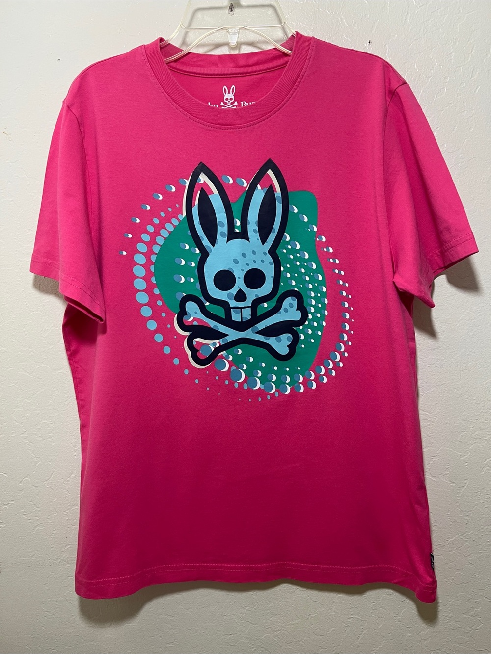 Psycho Bunny Hot Pink Tee with Teal & Light Blue Skull Graphic